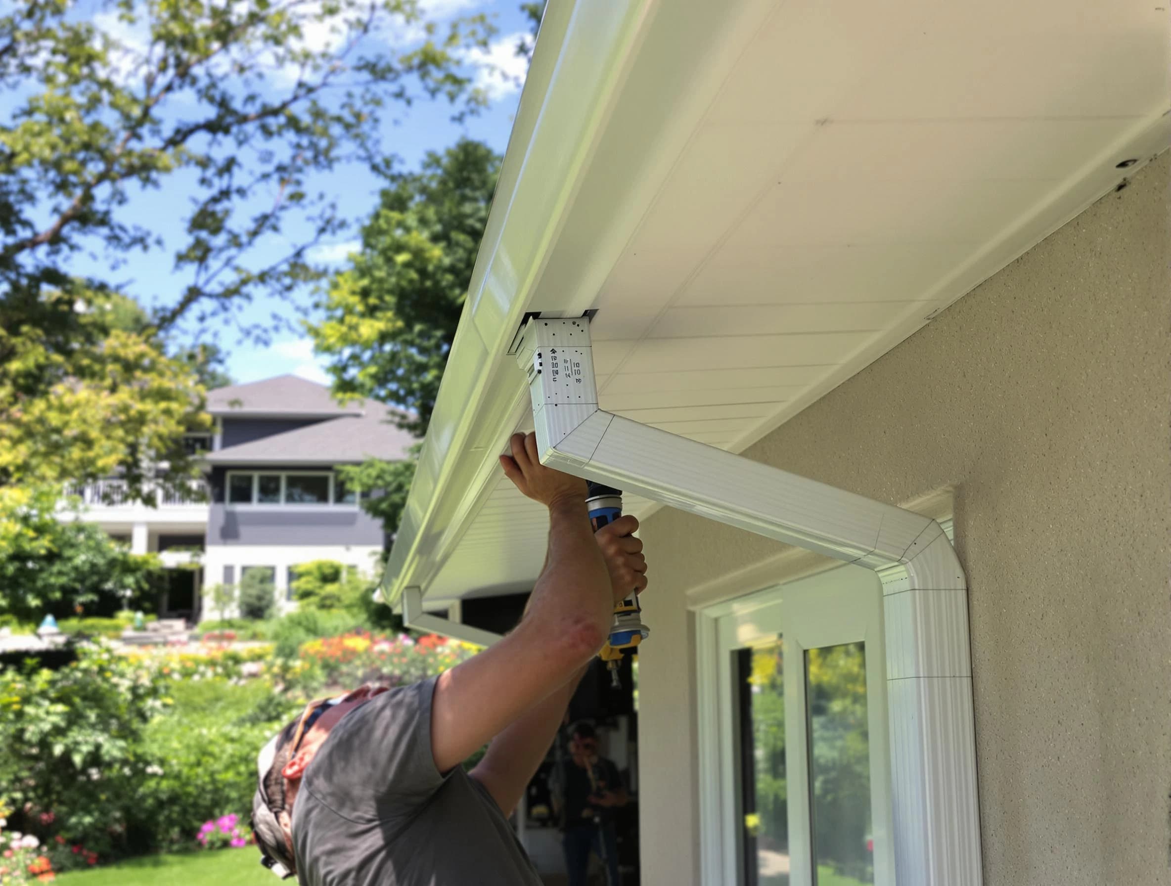 Parma Roofing Company technicians performing gutter installation in Parma, OH